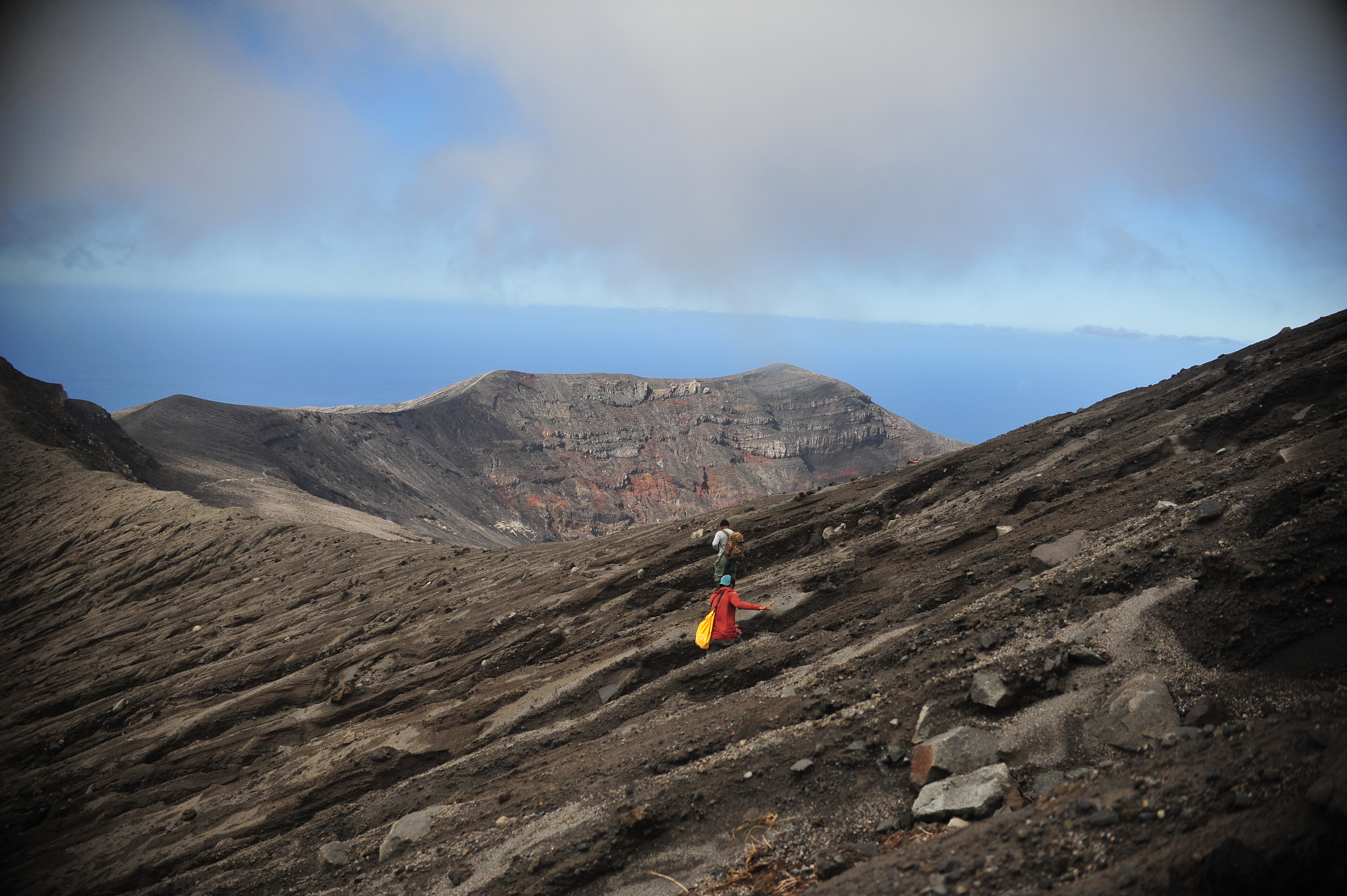 Clambering over mountains of ash to see into the crater - La Soufriére 2021